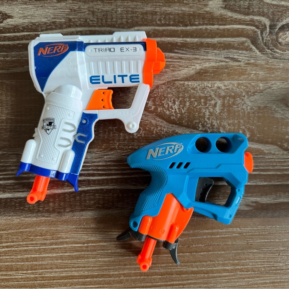 Two Small Nerf Foam Dart Guns